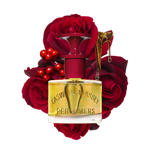 a bottle of perfume with flowers