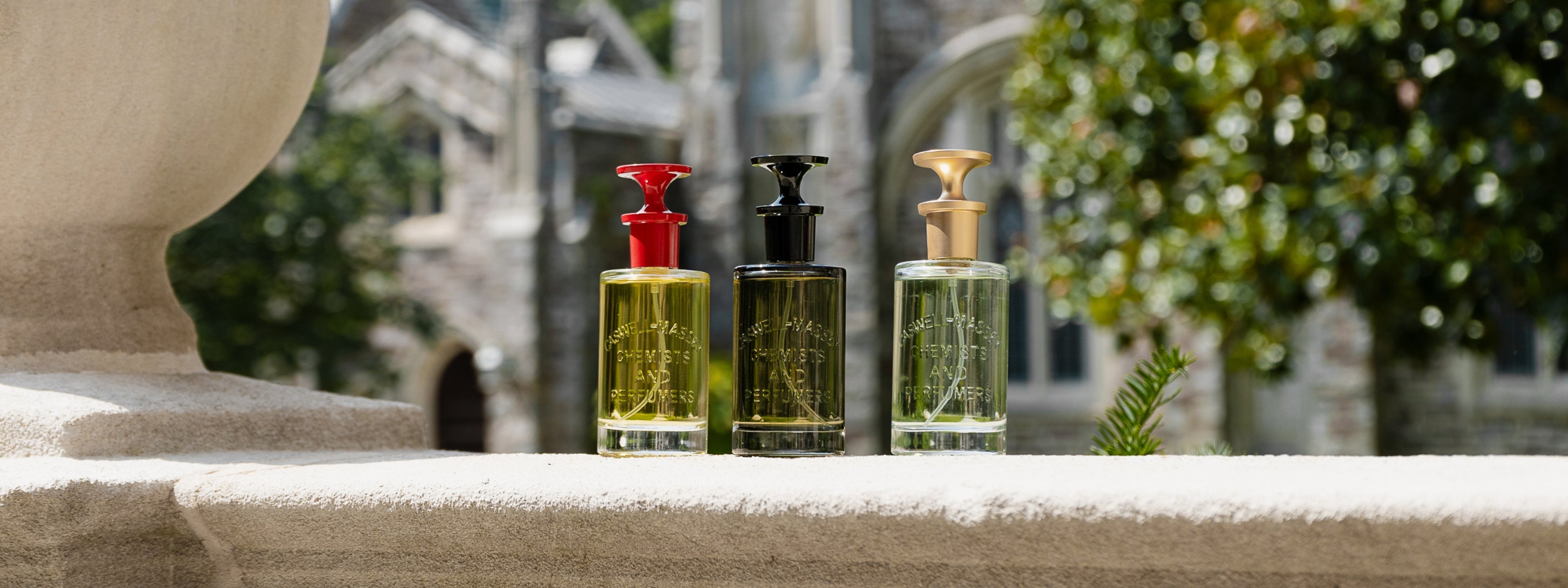 Caswell-Massey Eau de Parfums for Men: 3 fragrance bottles sitting on Princeton's campus